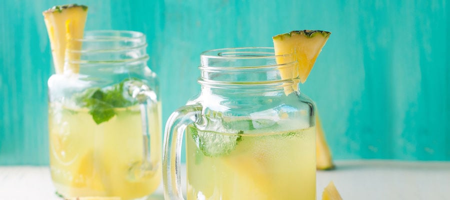 pineapple lemonade with lemon and mint, selective focus