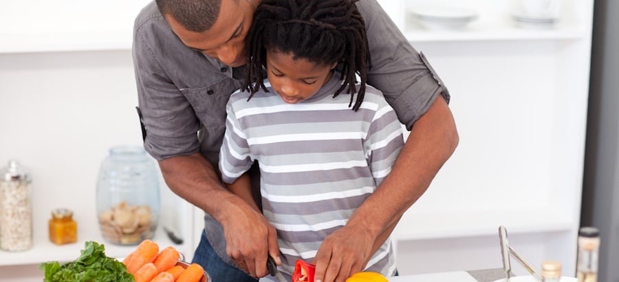 father son cooking