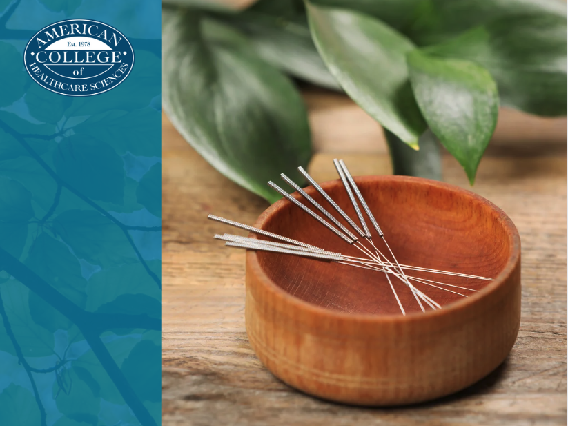 Acupuncture needles in a wooden bowl