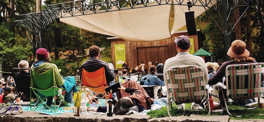 family at outdoor concert