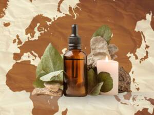 Essential oil bottle overlaying an ancient map