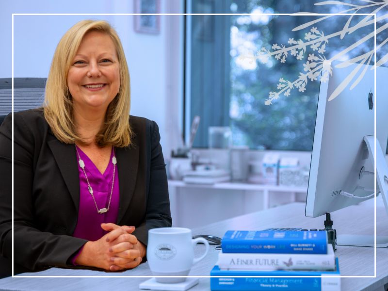 ACHS President Tracey Abell sits at her desk on campus