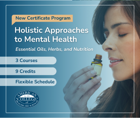 A woman smelling essential oil from a bottle