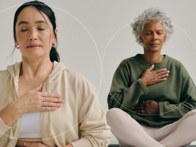 Two women doing meditative breathwork