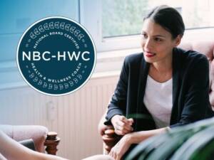 A health coach speaks with a client