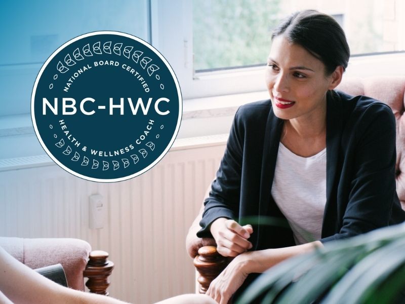 A health coach speaks with a client