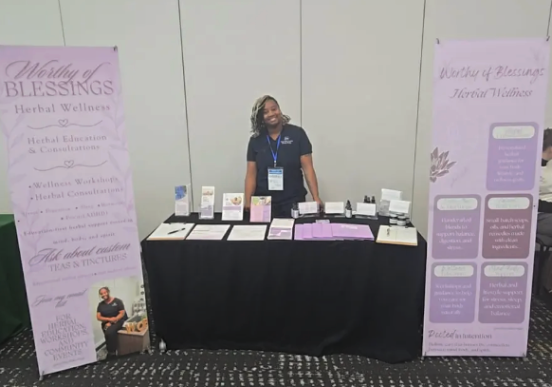 Kimberly Worthy at a vendor booth