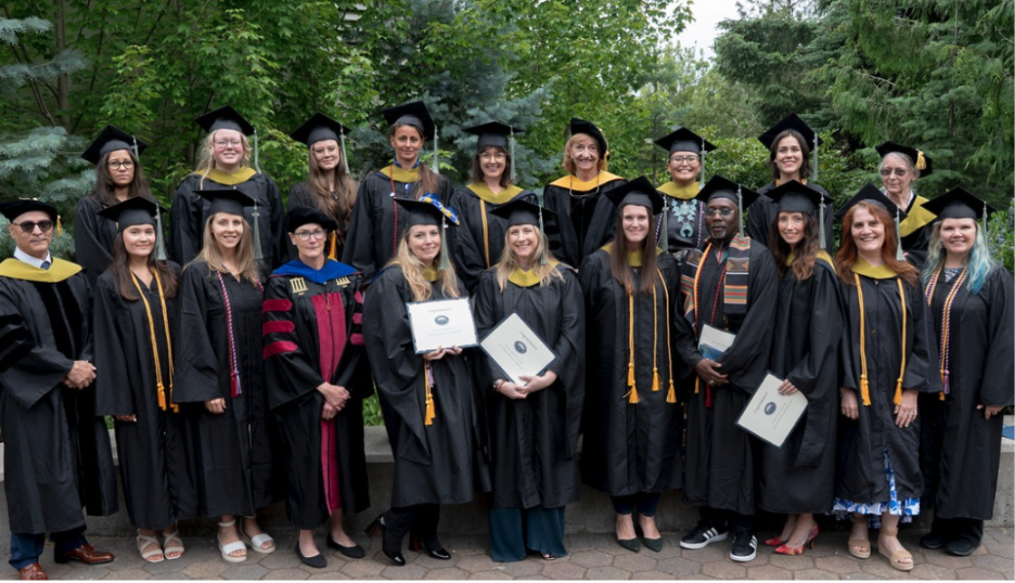 A group of ACHS graduates in regalia