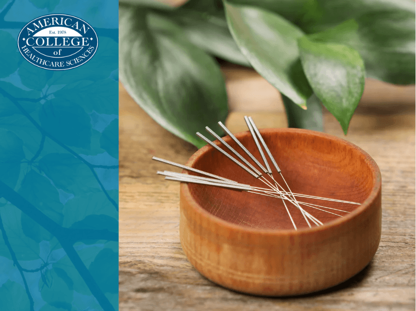 wooden bowl containing acupunture needles