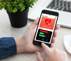 1. Image showing steps to use a heart rate app on a smartphone, featuring app interface and user interaction.