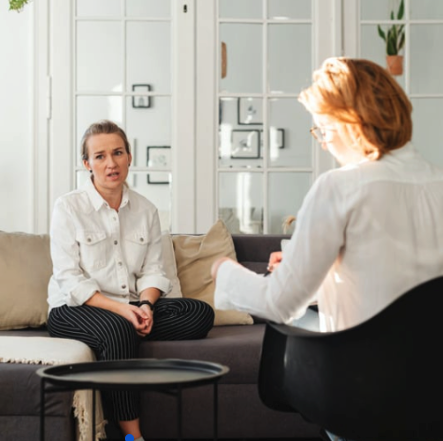 A mental wellness practitioner working with a client