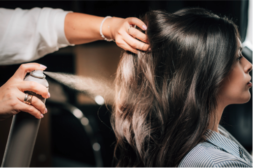 Applying hair spray