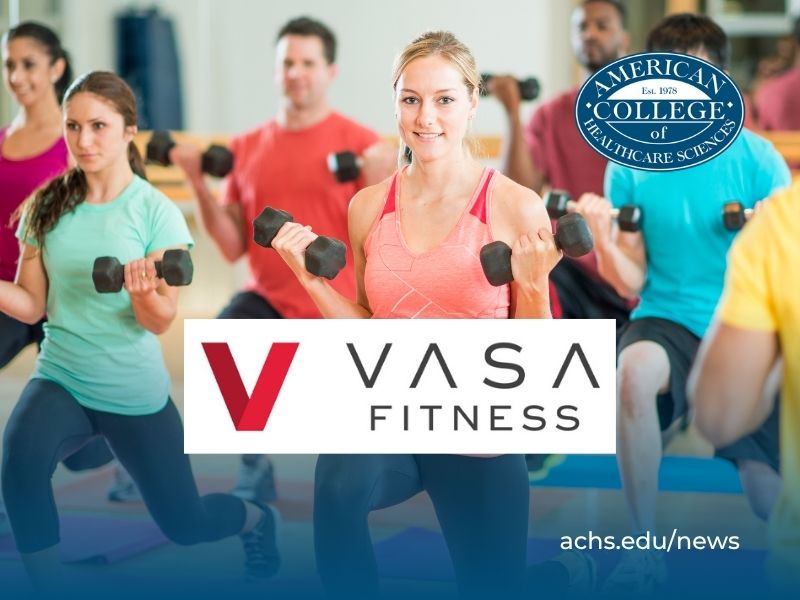 A group of people working out with weights in a gym