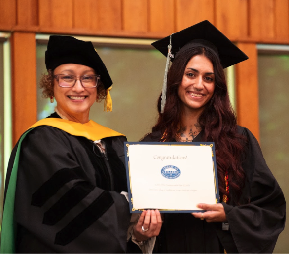 Dean Judith Thompson with an ACHS graduate