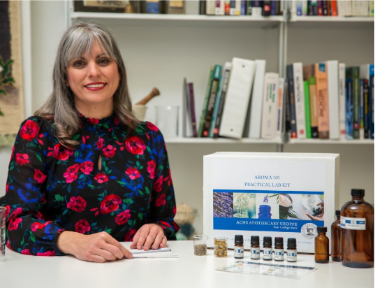 Amanda Lattin with an ACHS essential oils kit