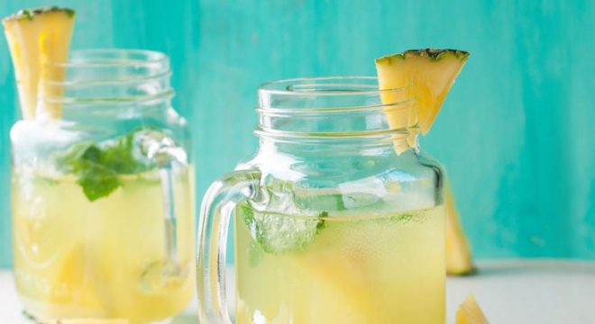 40565584 - pineapple lemonade with lemon and mint, selective focus