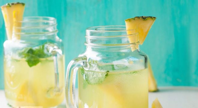 pineapple lemonade with lemon and mint, selective focus