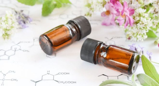 43359417 - essential oils on science sheet